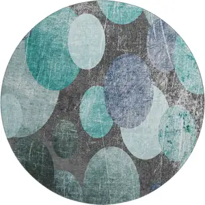 Photo of 8' Teal And Gray Abstract Washable Round Rug With UV Protection
