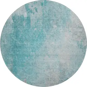 Photo of 8' Teal And Gray Abstract Washable Round Rug With UV Protection