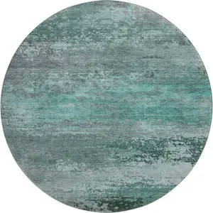 Photo of 8' Teal And Gray Abstract Washable Round Rug With UV Protection
