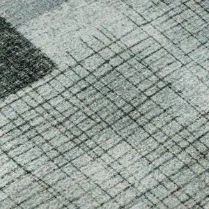 Photo of 8' Teal And Gray Geometric Washable Round Rug With UV Protection