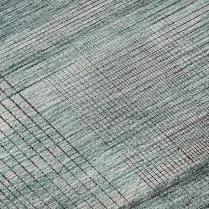 Photo of 8' Teal And Gray Striped Washable Round Rug With UV Protection