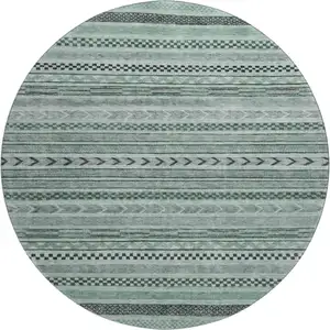 Photo of 8' Teal And Gray Striped Washable Round Rug With UV Protection