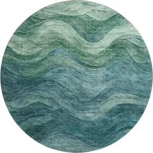 Photo of 8' Teal And Green Abstract Washable Round Rug With UV Protection
