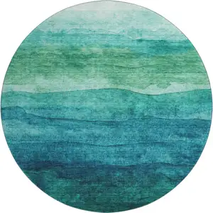 Photo of 8' Teal And Green Striped Washable Round Rug With UV Protection