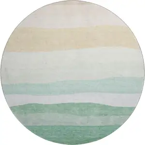 Photo of 8' Teal And Green Striped Washable Round Rug With UV Protection