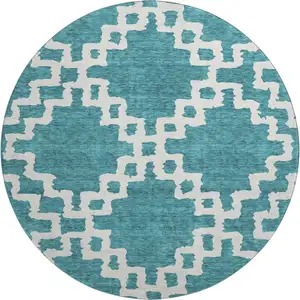 Photo of 8' Teal And Ivory Abstract Geometric Washable Round Rug With UV Protection