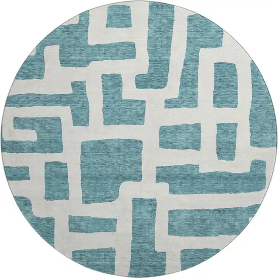 8' Teal And Ivory Abstract Geometric Washable Round Rug With UV Protection Photo 1