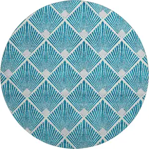 Photo of 8' Teal And Ivory Abstract Geometric Washable Round Rug With UV Protection