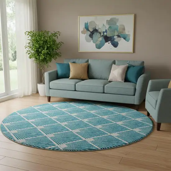 8' Teal And Ivory Abstract Geometric Washable Round Rug With UV Protection Photo 1