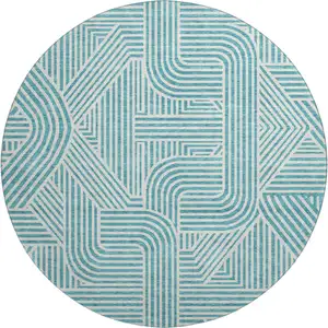 Photo of 8' Teal And Ivory Abstract Geometric Washable Round Rug With UV Protection