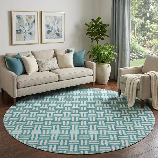8' Teal And Ivory Abstract Geometric Washable Round Rug With UV Protection Photo 1