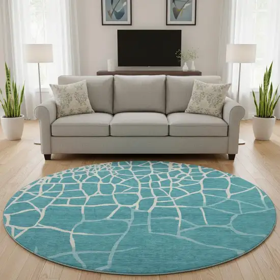 8' Teal And Ivory Abstract Geometric Washable Round Rug With UV Protection Photo 2