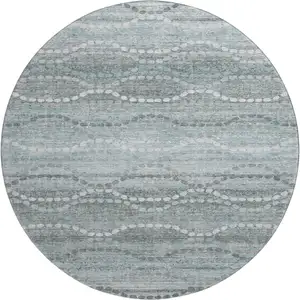 Photo of 8' Teal And Ivory Abstract Geometric Washable Round Rug With UV Protection