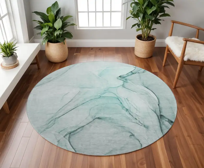 8' Teal And Ivory Abstract Washable Round Rug With UV Protection Photo 2