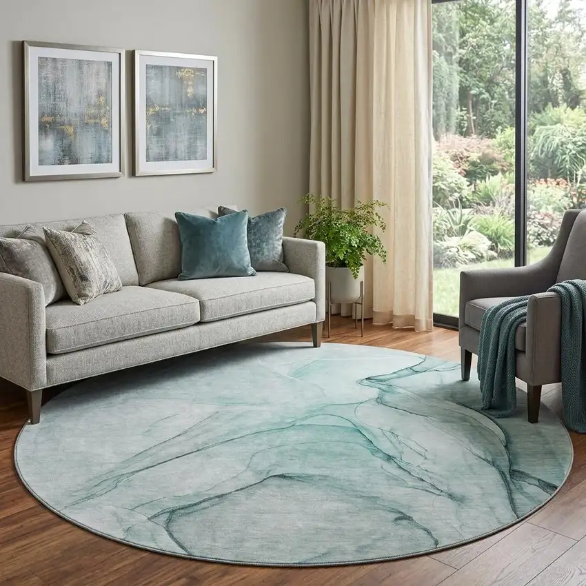 8' Teal And Ivory Abstract Washable Round Rug With UV Protection Photo 1