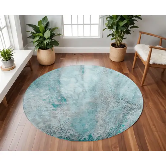 8' Teal And Ivory Abstract Washable Round Rug With UV Protection Photo 2