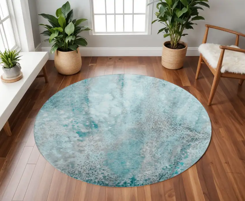 8' Teal And Ivory Abstract Washable Round Rug With UV Protection Photo 2