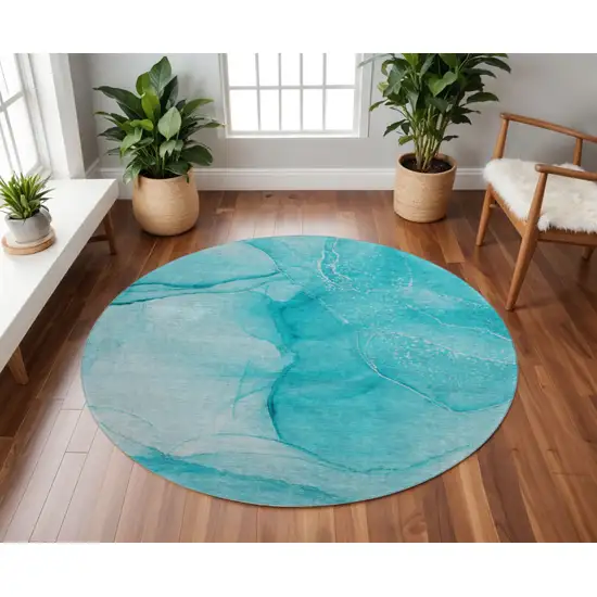 8' Teal And Ivory Abstract Washable Round Rug With UV Protection Photo 2