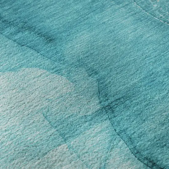 8' Teal And Ivory Abstract Washable Round Rug With UV Protection Photo 9
