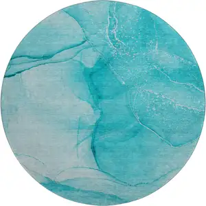 Photo of 8' Teal And Ivory Abstract Washable Round Rug With UV Protection