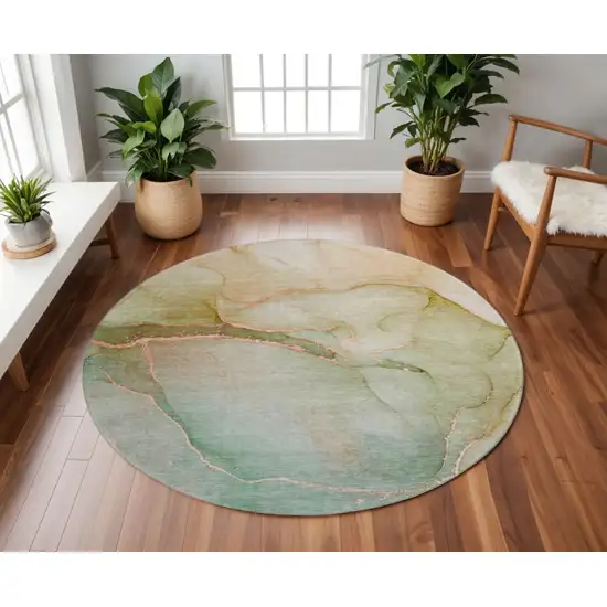 8' Teal And Ivory Abstract Washable Round Rug With UV Protection Photo 2