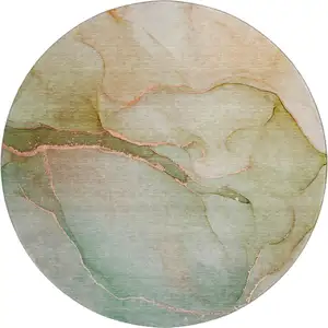 Photo of 8' Teal And Ivory Abstract Washable Round Rug With UV Protection