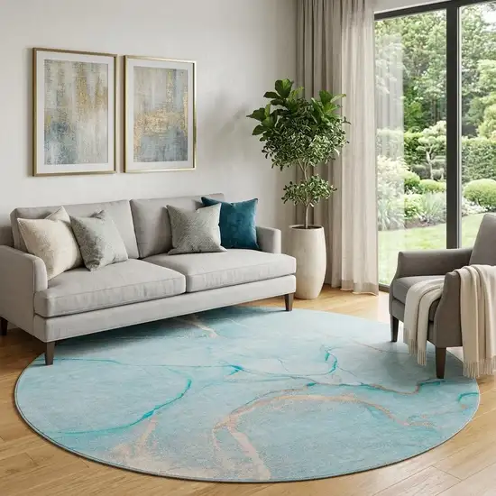 8' Teal And Ivory Abstract Washable Round Rug With UV Protection Photo 1