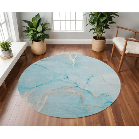 8' Teal And Ivory Abstract Washable Round Rug With UV Protection Photo 2