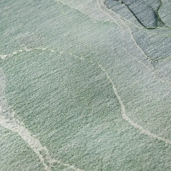 8' Teal And Ivory Abstract Washable Round Rug With UV Protection Photo 9