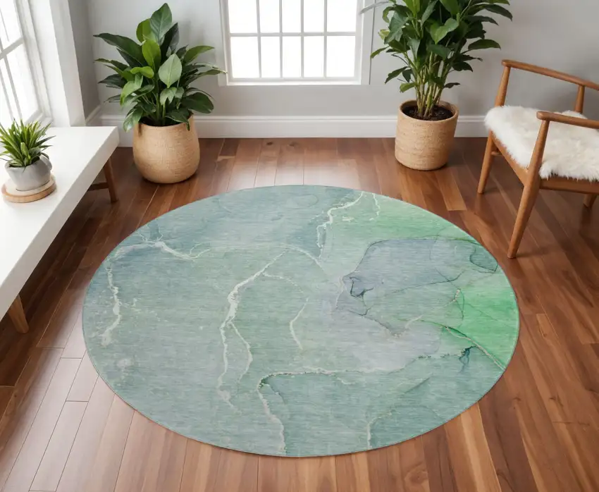 8' Teal And Ivory Abstract Washable Round Rug With UV Protection Photo 2