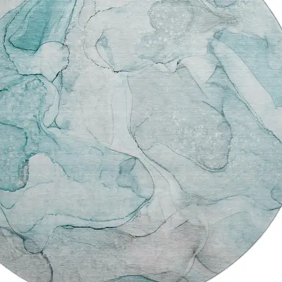 8' Teal And Ivory Abstract Washable Round Rug With UV Protection Photo 3