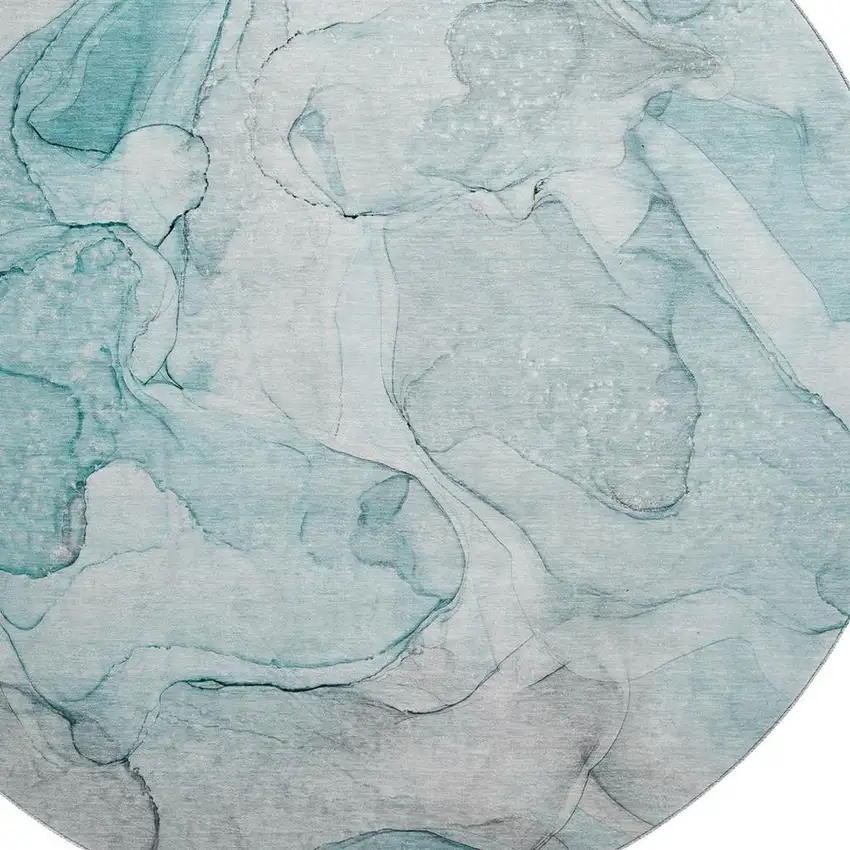 8' Teal And Ivory Abstract Washable Round Rug With UV Protection Photo 3