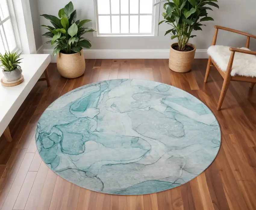 8' Teal And Ivory Abstract Washable Round Rug With UV Protection Photo 2
