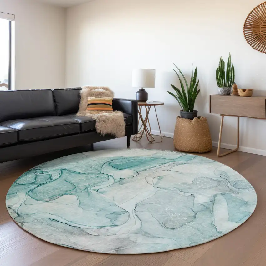 8' Teal And Ivory Abstract Washable Round Rug With UV Protection Photo 5