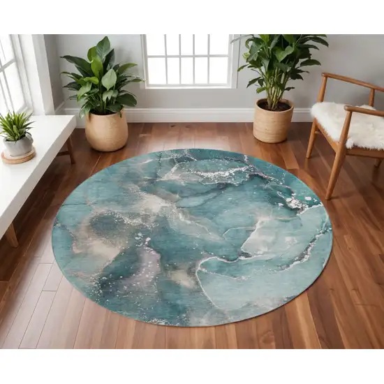 8' Teal And Ivory Abstract Washable Round Rug With UV Protection Photo 2