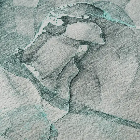 8' Teal And Ivory Abstract Washable Round Rug With UV Protection Photo 9