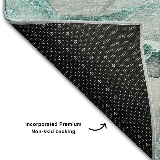 8' Teal And Ivory Abstract Washable Round Rug With UV Protection Photo 6