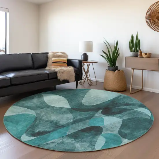 8' Teal And Ivory Abstract Washable Round Rug With UV Protection Photo 5