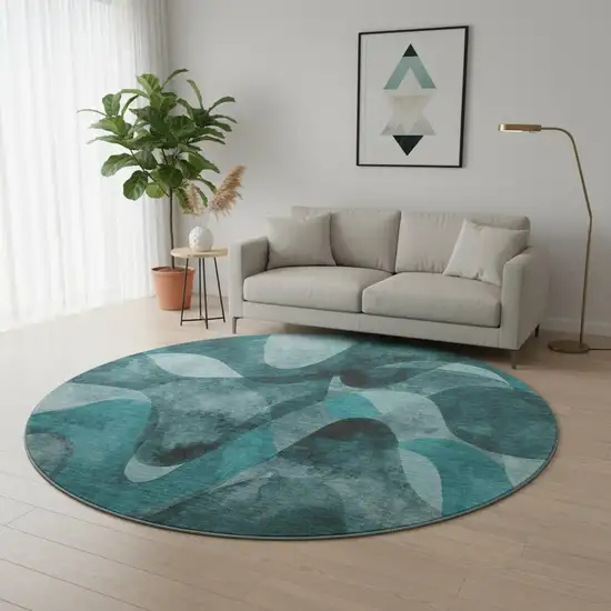 8' Teal And Ivory Abstract Washable Round Rug With UV Protection Photo 2