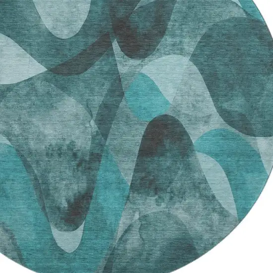 8' Teal And Ivory Abstract Washable Round Rug With UV Protection Photo 3
