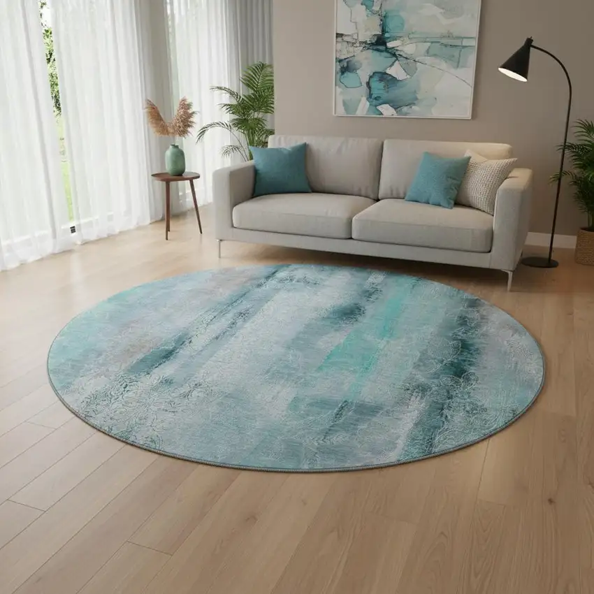 8' Teal And Ivory Abstract Washable Round Rug With UV Protection Photo 2