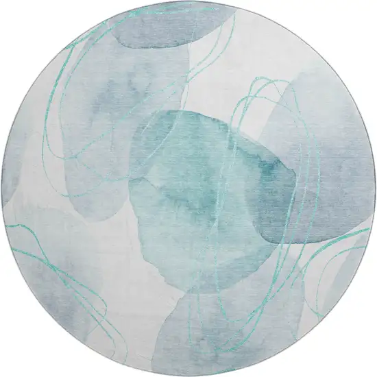 8' Teal And Ivory Abstract Washable Round Rug With UV Protection Photo 1