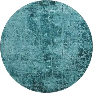 Photo of 8' Teal And Ivory Abstract Washable Round Rug With UV Protection