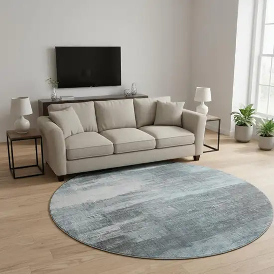 8' Teal And Ivory Abstract Washable Round Rug With UV Protection Photo 2