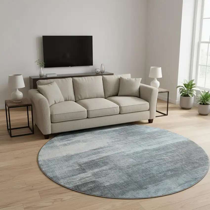 8' Teal And Ivory Abstract Washable Round Rug With UV Protection Photo 2