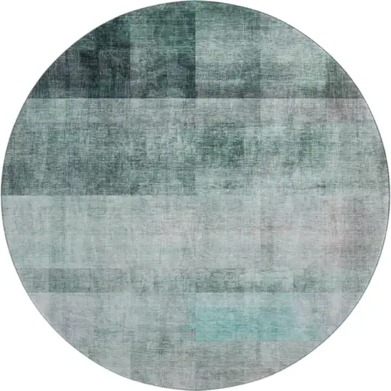 8' Teal And Ivory Abstract Washable Round Rug With UV Protection Photo 1