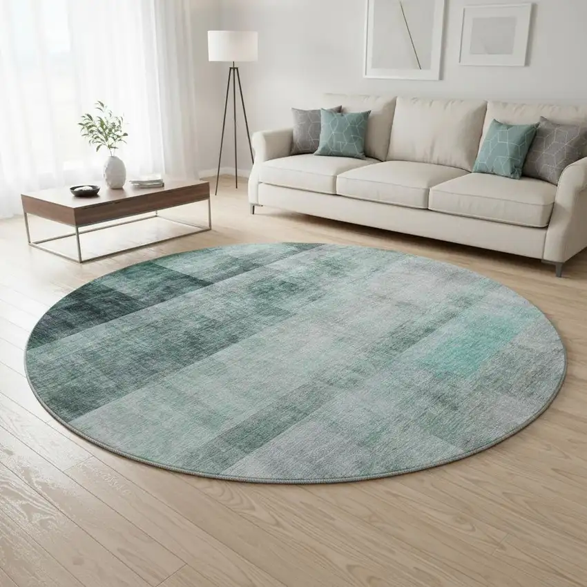 8' Teal And Ivory Abstract Washable Round Rug With UV Protection Photo 2