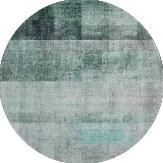 8' Teal And Ivory Abstract Washable Round Rug With UV Protection Photo 3