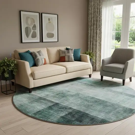 8' Teal And Ivory Abstract Washable Round Rug With UV Protection Photo 1