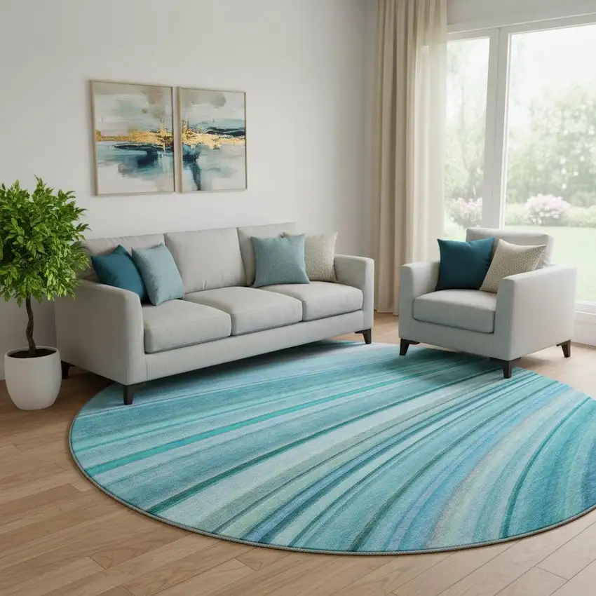 8' Teal And Ivory Abstract Washable Round Rug With UV Protection Photo 1